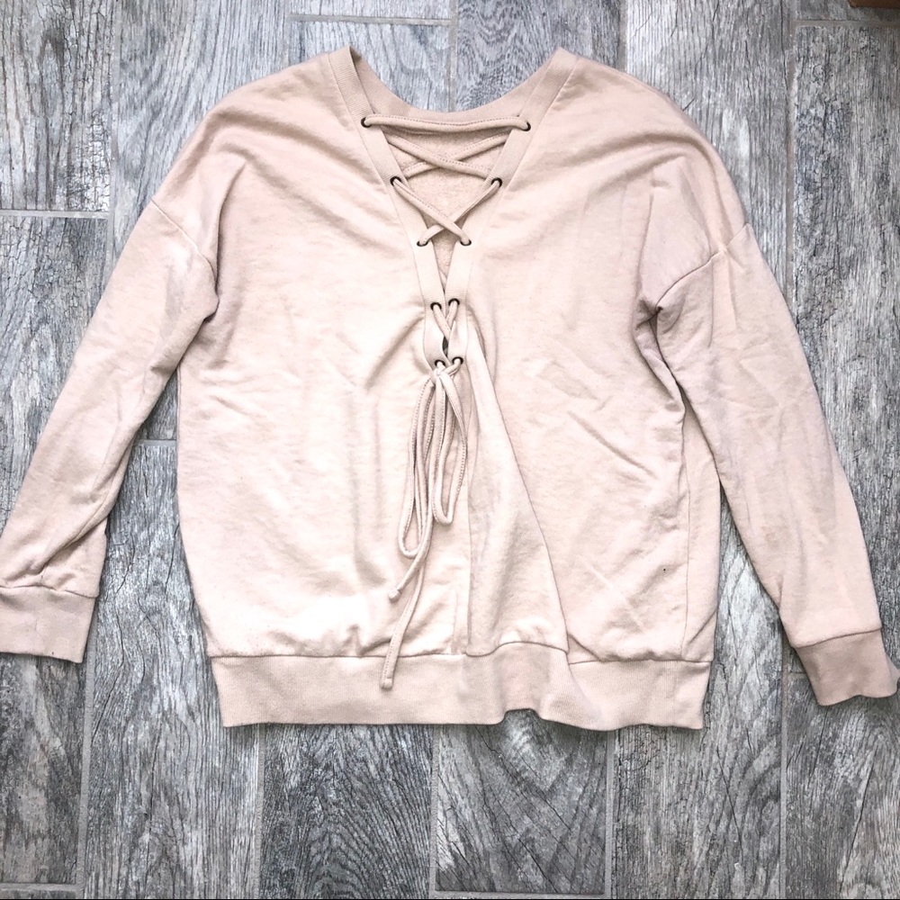 Tan sweatshirt with lace up string